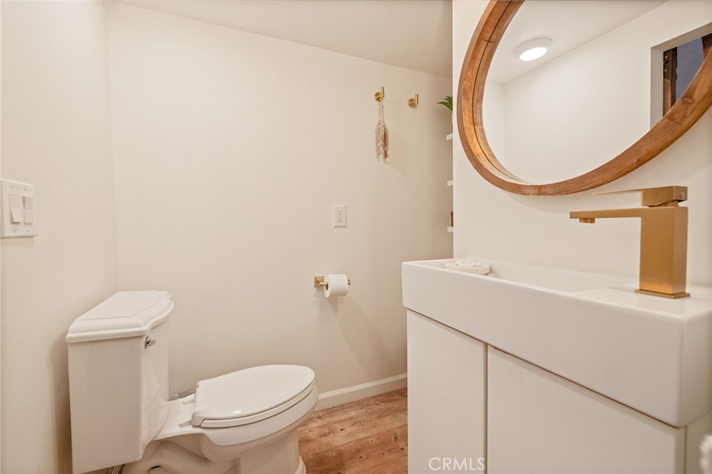 33940 Jennifer Way Coarsegold, CA 93614 - Photo 5 of 75 a bathroom with a sink and a mirror
