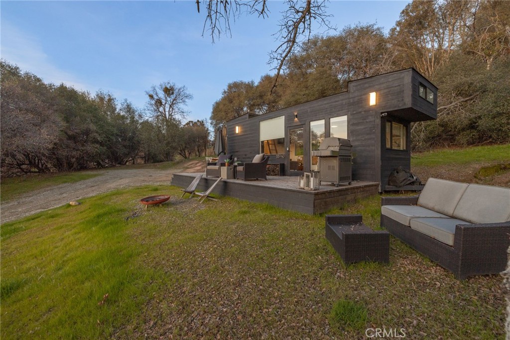 33940 Jennifer Way Coarsegold, CA 93614 - Photo 57 of 75 a view of a patio with swimming pool table and chairs