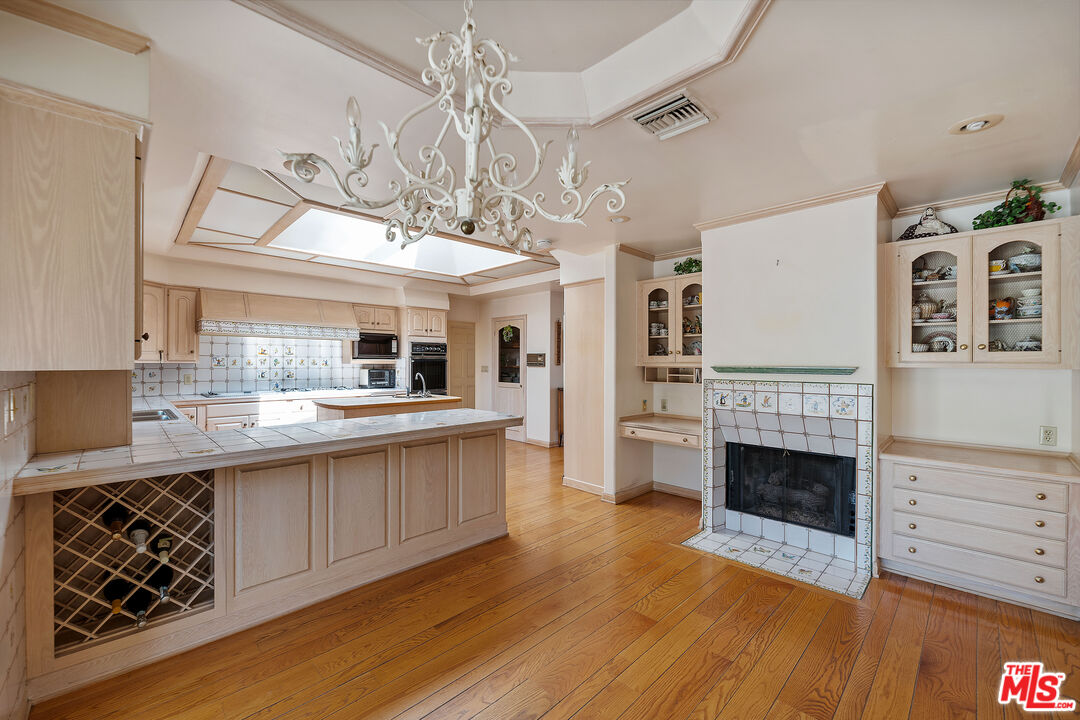 950 Hampton Road Arcadia, CA 91006 - Photo 13 of 33 a kitchen with stainless steel appliances granite countertop a stove and cabinets