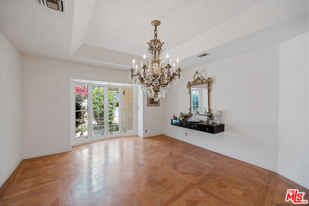 950 Hampton Road Arcadia, CA 91006 - Photo 16 of 33 a view of a chandelier in big room and chandelier