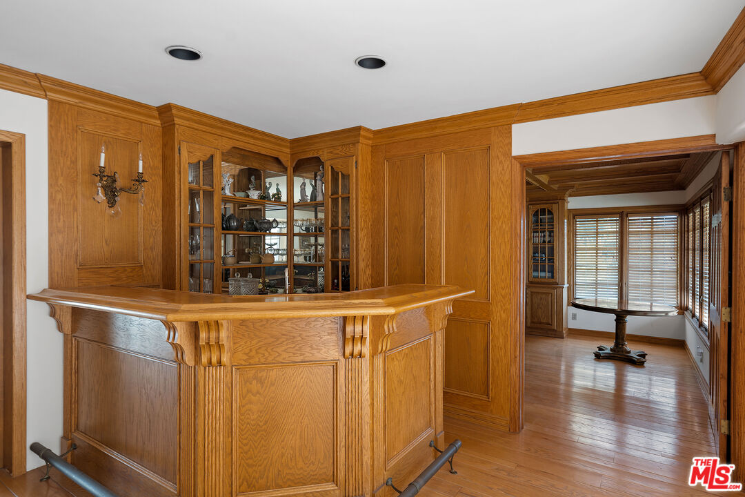 950 Hampton Road Arcadia, CA 91006 - Photo 17 of 33 a view of a hallway with wooden floor and a cabinet