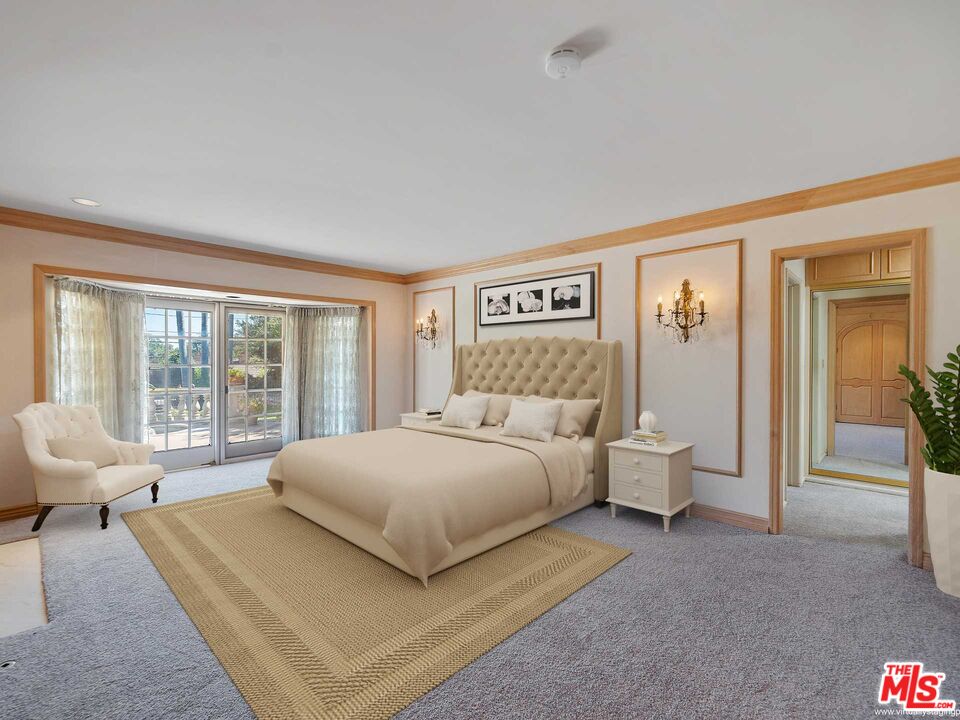 950 Hampton Road Arcadia, CA 91006 - Photo 19 of 33 a spacious bedroom with a bed and a large window