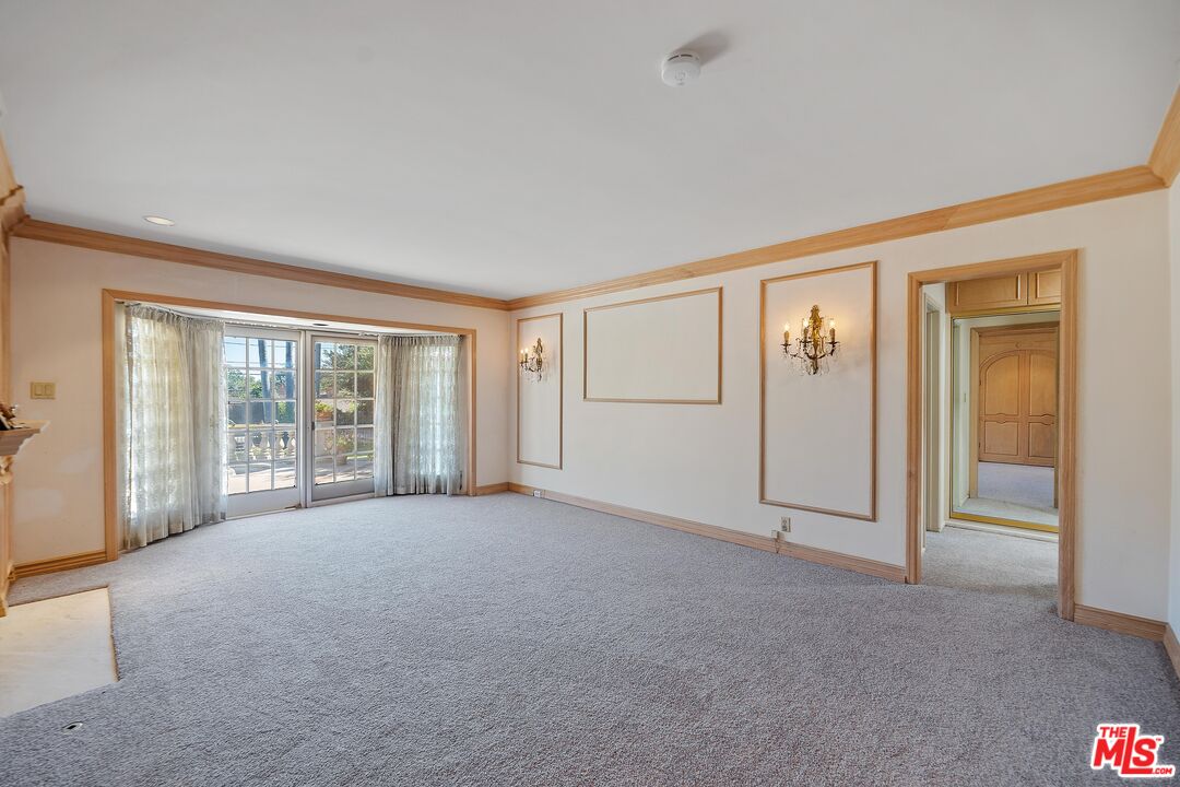 950 Hampton Road Arcadia, CA 91006 - Photo 20 of 33 a view of an empty room with glass door
