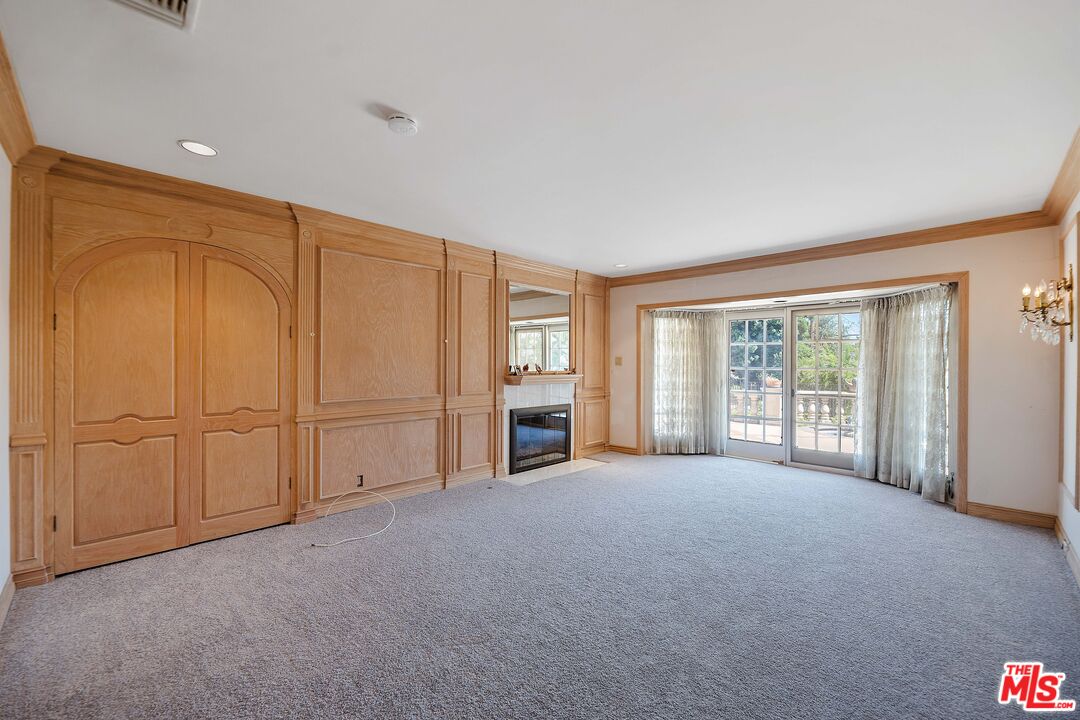 950 Hampton Road Arcadia, CA 91006 - Photo 22 of 33 a view of an empty room with a window
