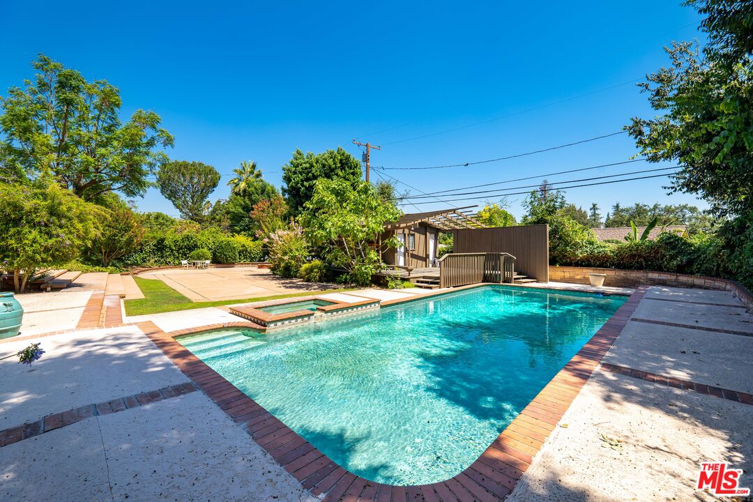 950 Hampton Road Arcadia, CA 91006 - Photo 28 of 33 a view of a backyard with swimming pool