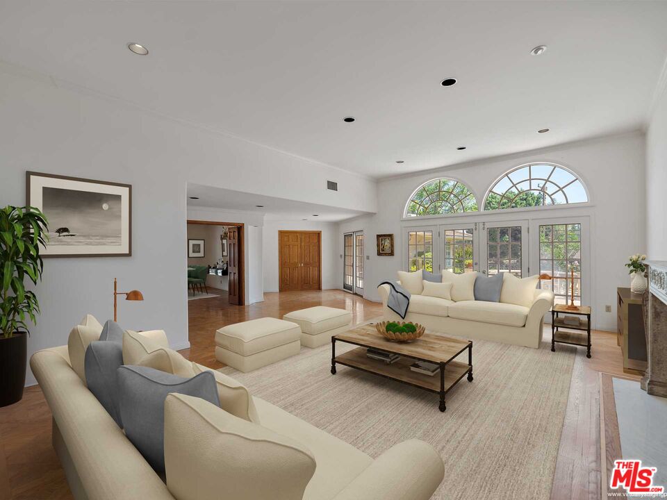 950 Hampton Road Arcadia, CA 91006 - Photo 7 of 33 a living room with furniture and a large window