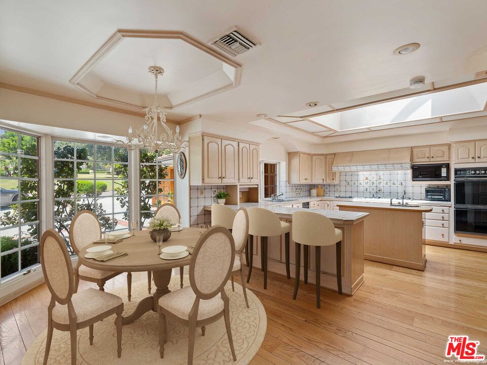 950 Hampton Road Arcadia, CA 91006 - Photo 10 of 33 a view of a dining room with furniture wooden floor and chandelier