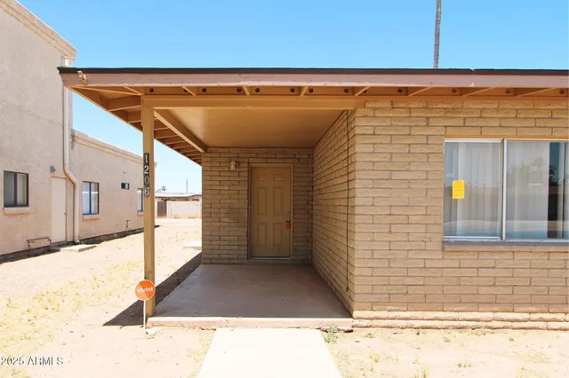 a view of a backyard with a outdoor space