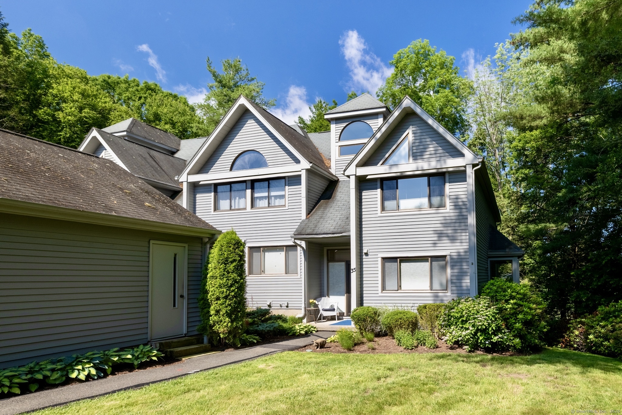 a house view with a garden space