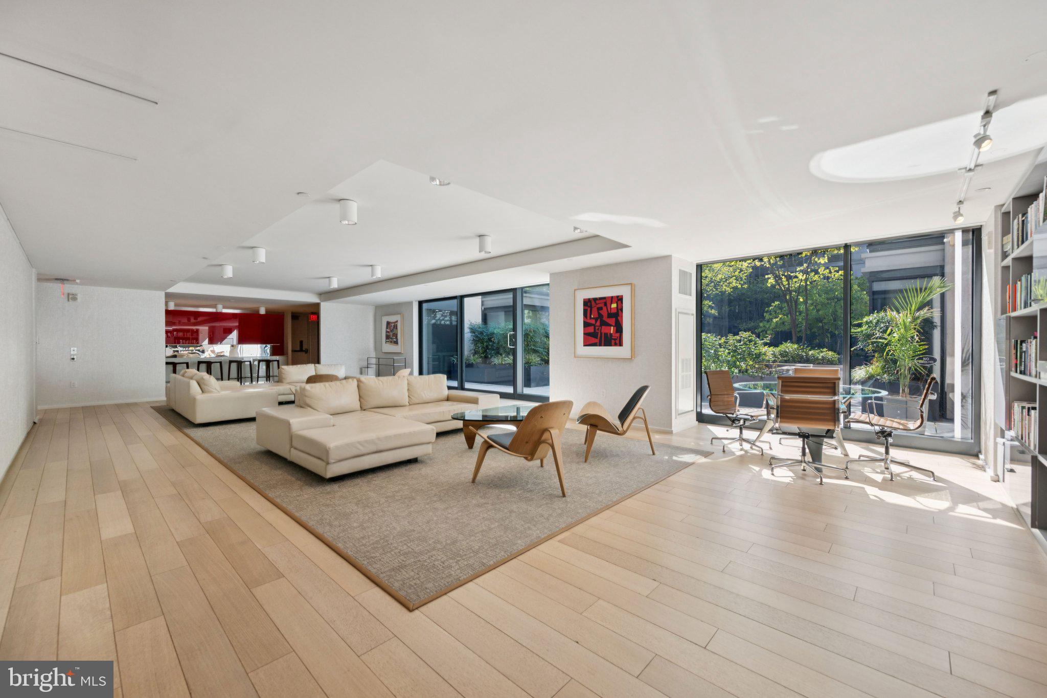 925 H Street Northwest, Unit 903 Washington, DC 20001 - Photo 24 of 36 a living room with furniture and a large window