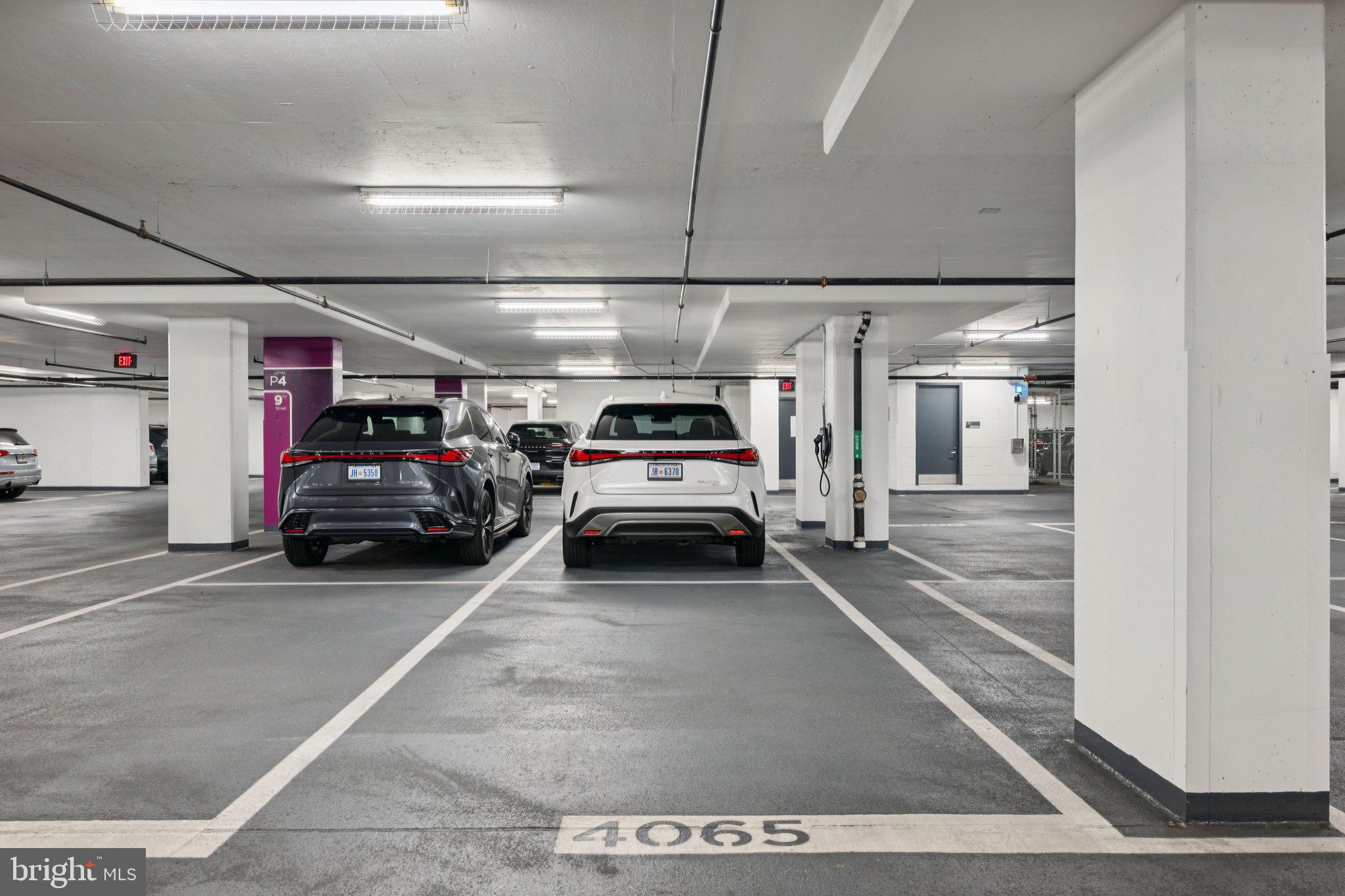 925 H Street Northwest, Unit 903 Washington, DC 20001 - Photo 27 of 36 a view of parking garage with cars parked
