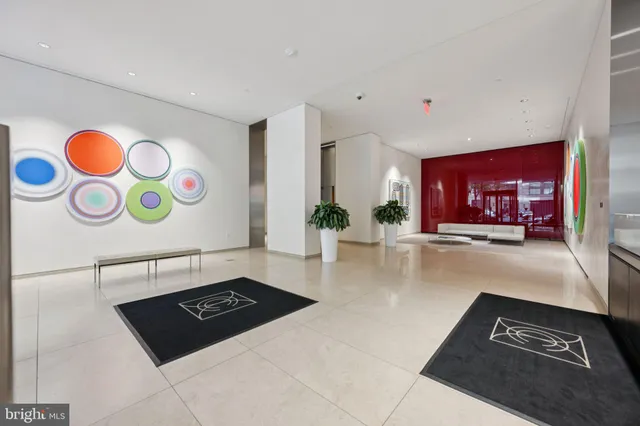 a view of path along with retail shop and buildings