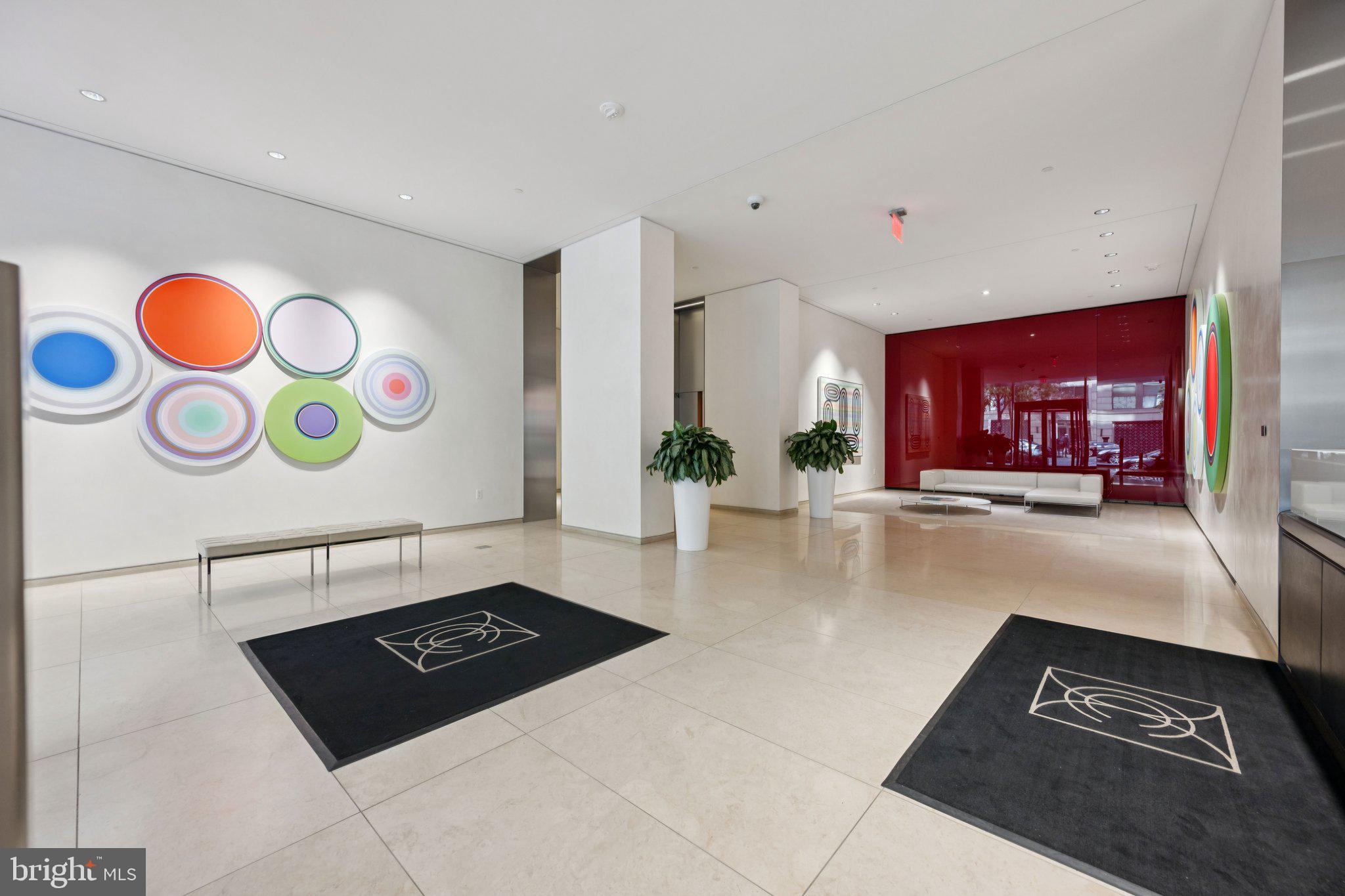 925 H Street Northwest, Unit 903 Washington, DC 20001 - Photo 31 of 36 a view of an entryway with a rug