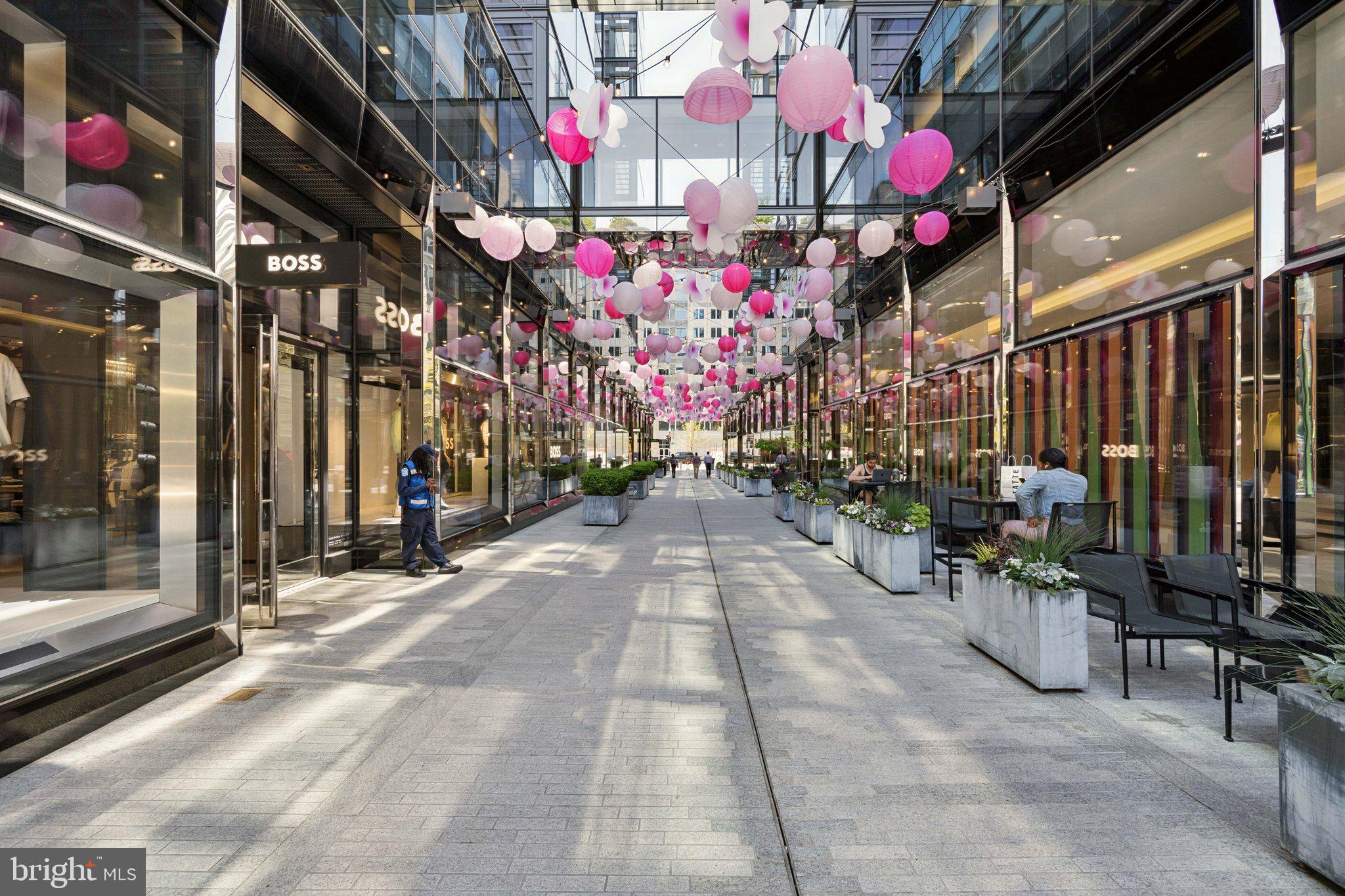 925 H Street Northwest, Unit 903 Washington, DC 20001 - Photo 32 of 36 a view of path along with retail shop and buildings