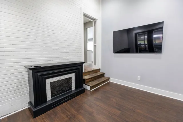 a living room with a fireplace