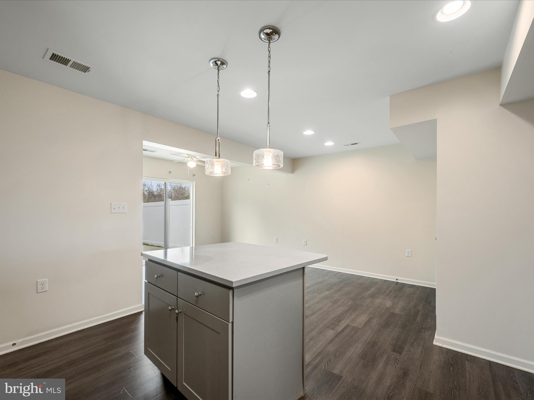 640 Thumper Drive Ranson, WV 25438 - Photo 15 of 50 a kitchen with a refrigerator a sink and wooden floor