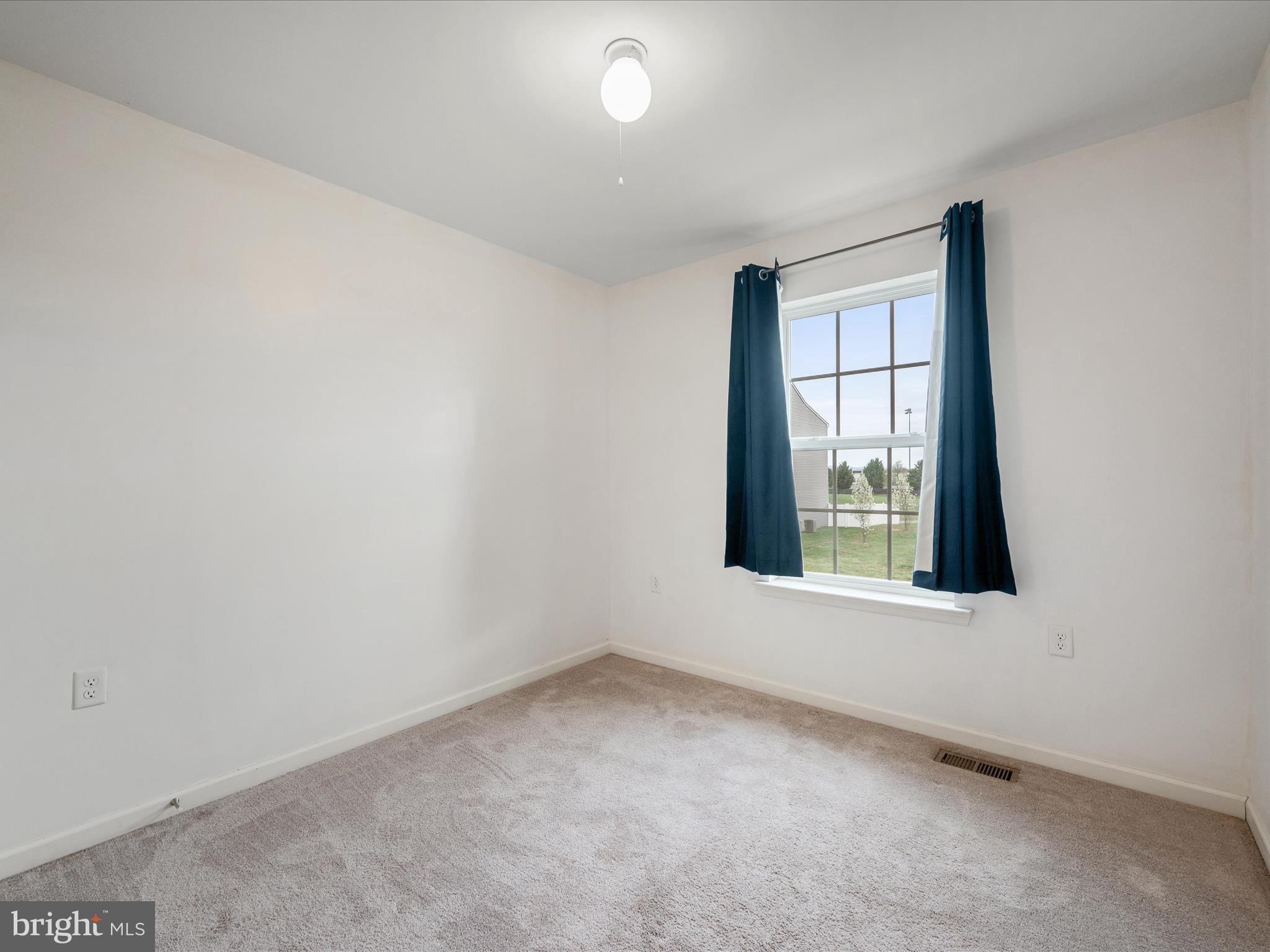 640 Thumper Drive Ranson, WV 25438 - Photo 22 of 50 an empty room with a window