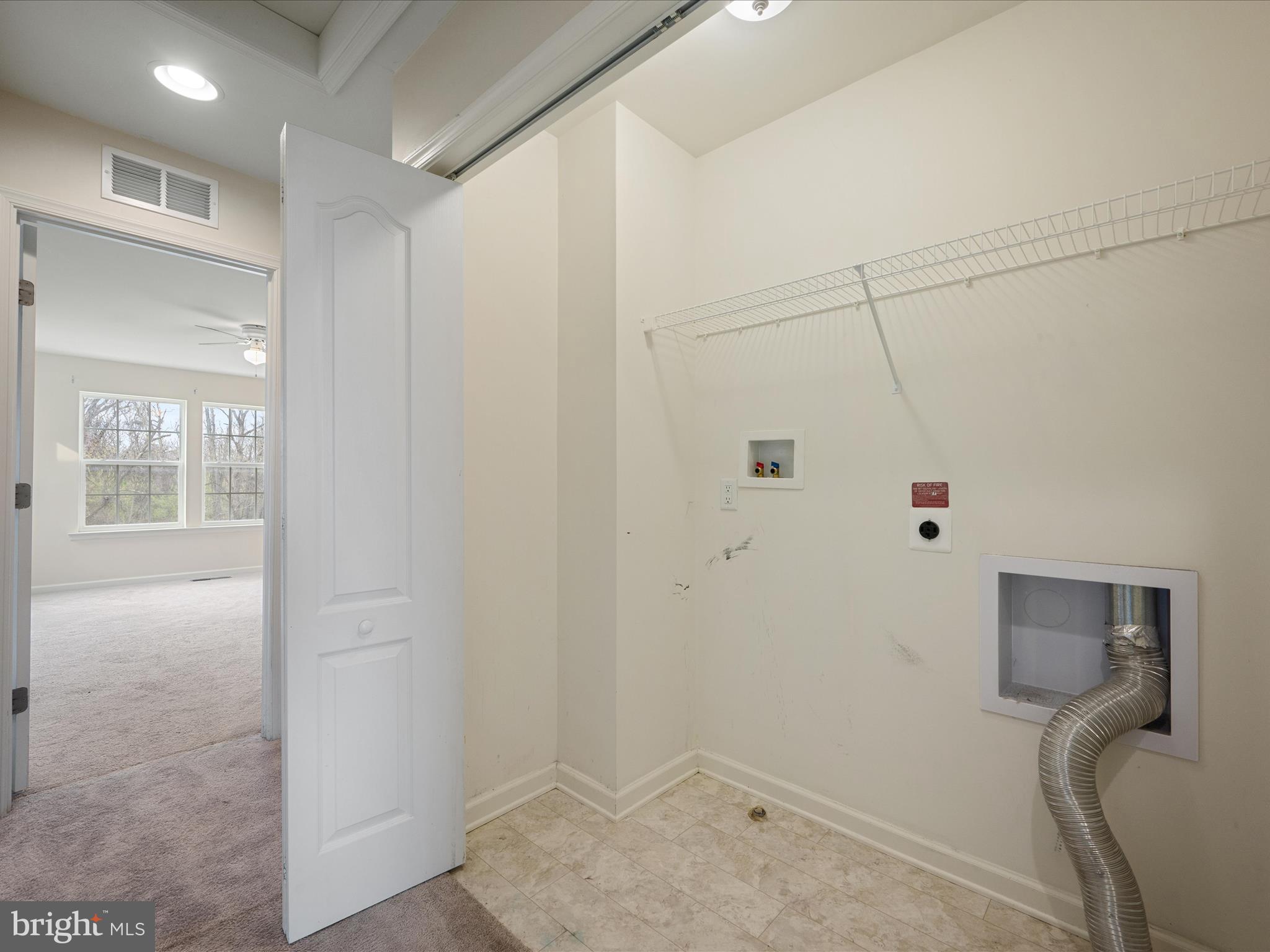 640 Thumper Drive Ranson, WV 25438 - Photo 25 of 50 a view of storage and utility room with a hallway