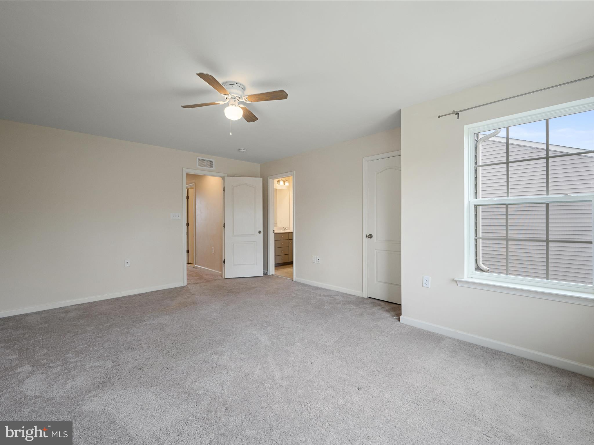 640 Thumper Drive Ranson, WV 25438 - Photo 29 of 50 a view of an empty room with a window