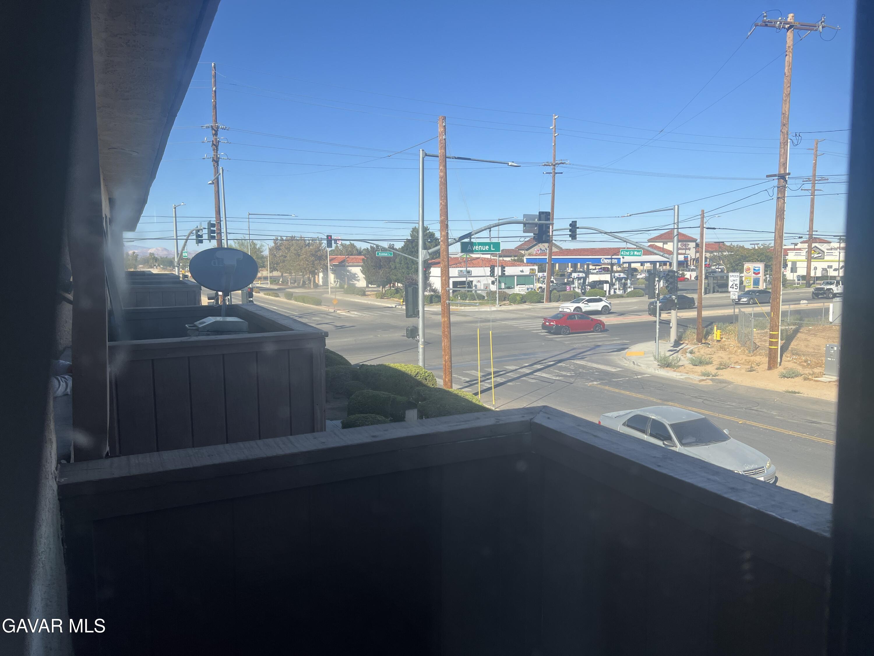 4202 West Ave L, Unit 7 Quartz Hill, CA 93536 - Photo 13 of 14 a view of a balcony with city view