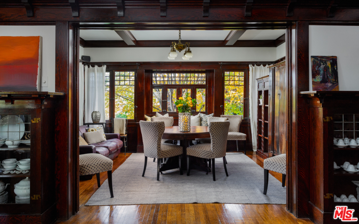 4570 University Avenue Riverside, CA 92501 - Photo 12 of 40 a view of a dining room with furniture and a window