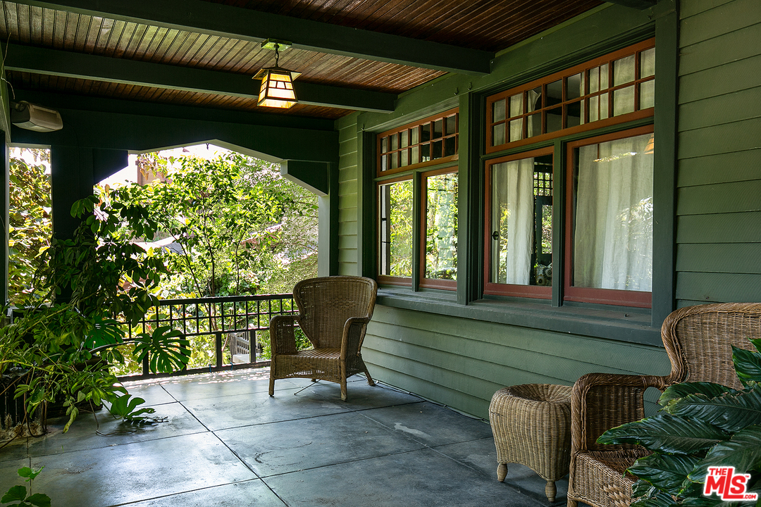 4570 University Avenue Riverside, CA 92501 - Photo 4 of 40 a view of patio with table and chairs and potted plants