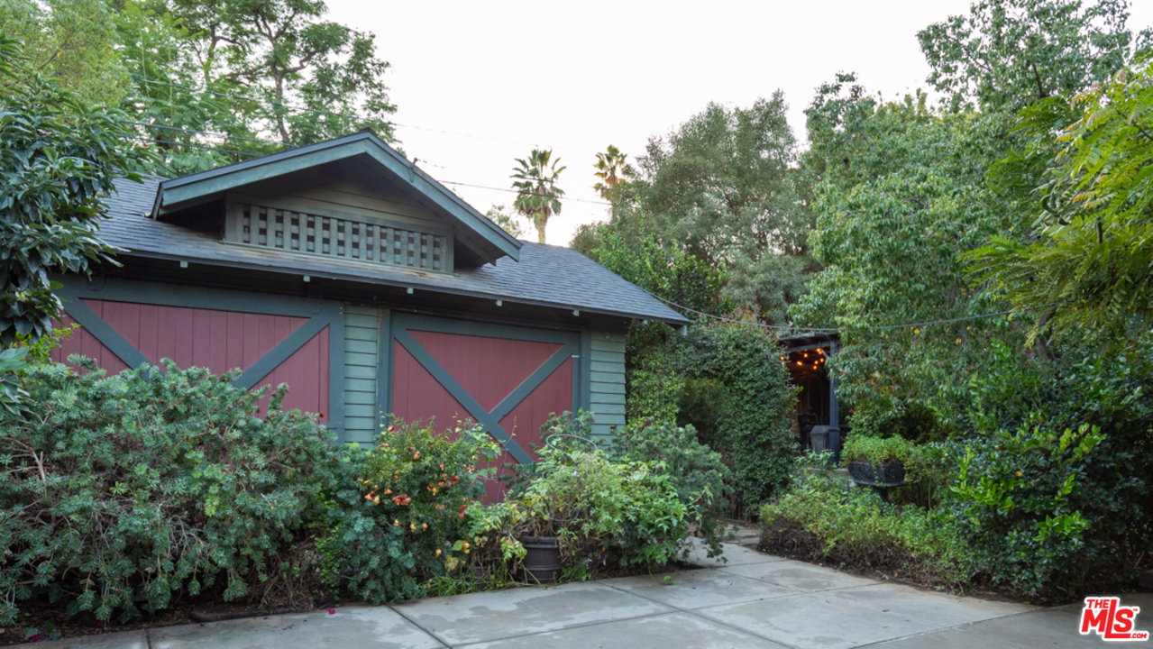 4570 University Avenue Riverside, CA 92501 - Photo 39 of 40 a view of a house with a yard potted plants