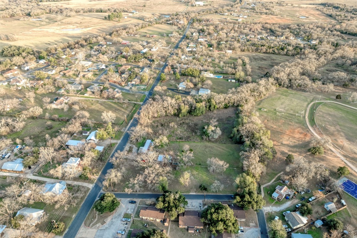 Lot 3 East Alamo Street Elgin, TX 78621 - Photo 12 of 15 an aerial view of house with yard