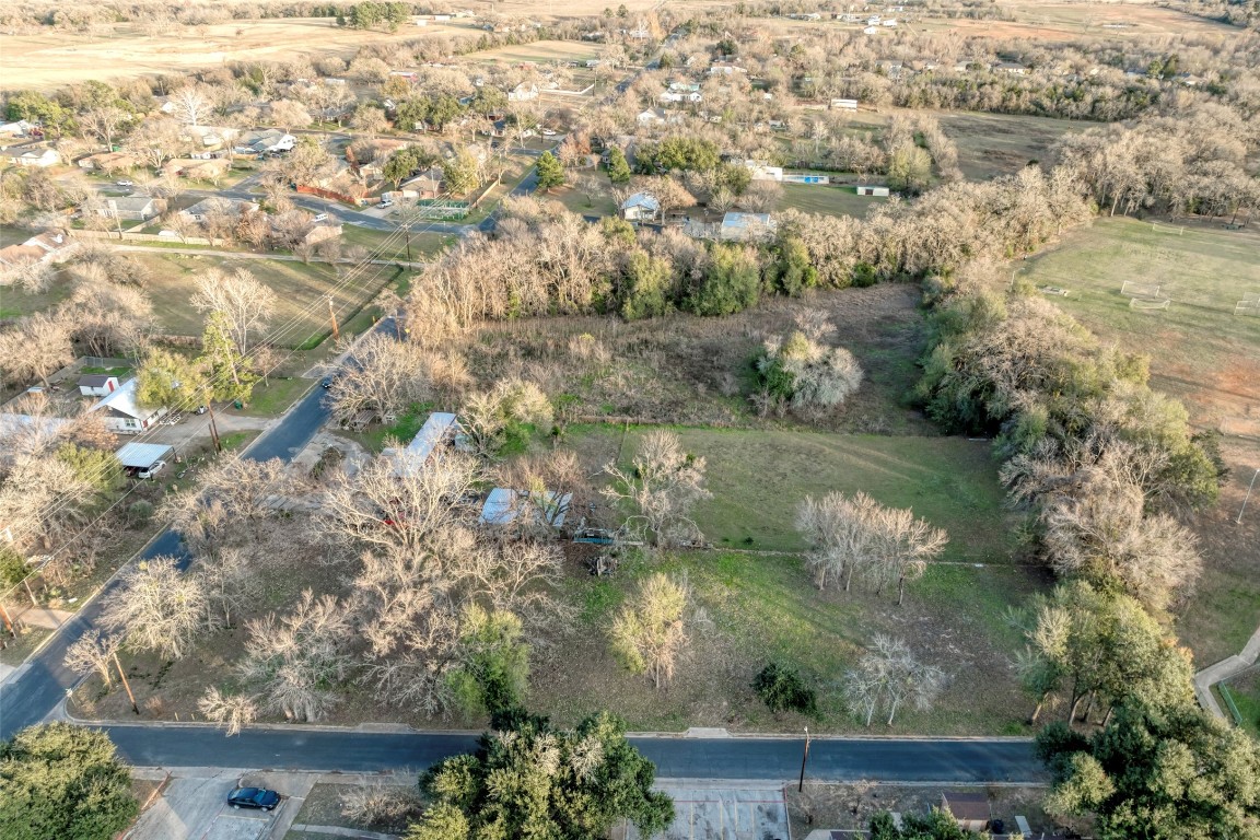 Lot 3 East Alamo Street Elgin, TX 78621 - Photo 9 of 15 an aerial view of residential houses with outdoor space and trees