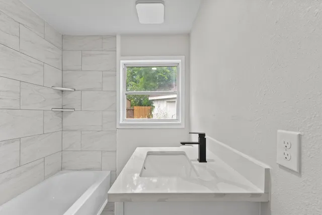 a bathroom with a bathtub