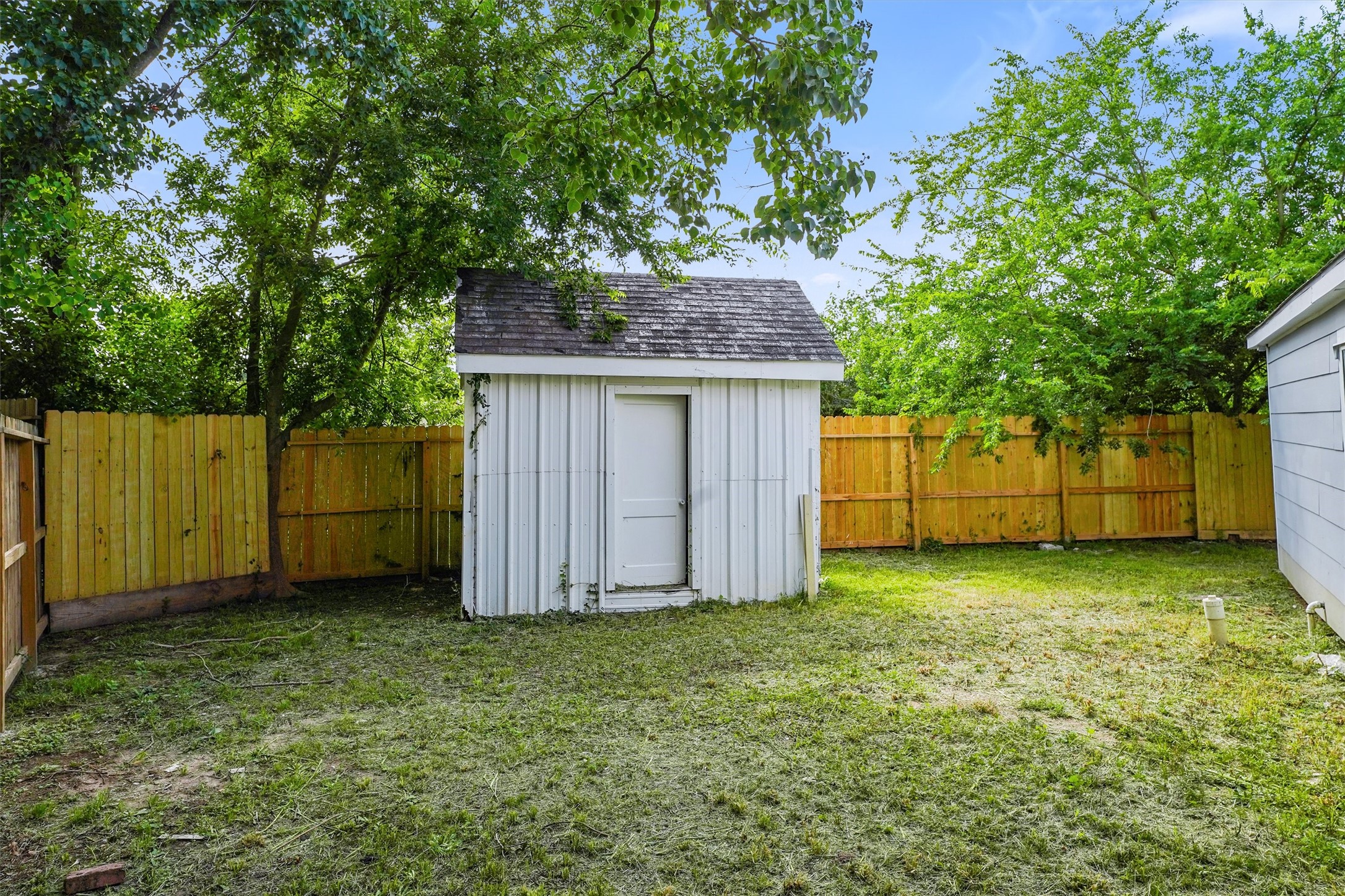 1615 Hiller Street Houston, TX 77015 - Photo 26 of 26 a house with a tree in the grass