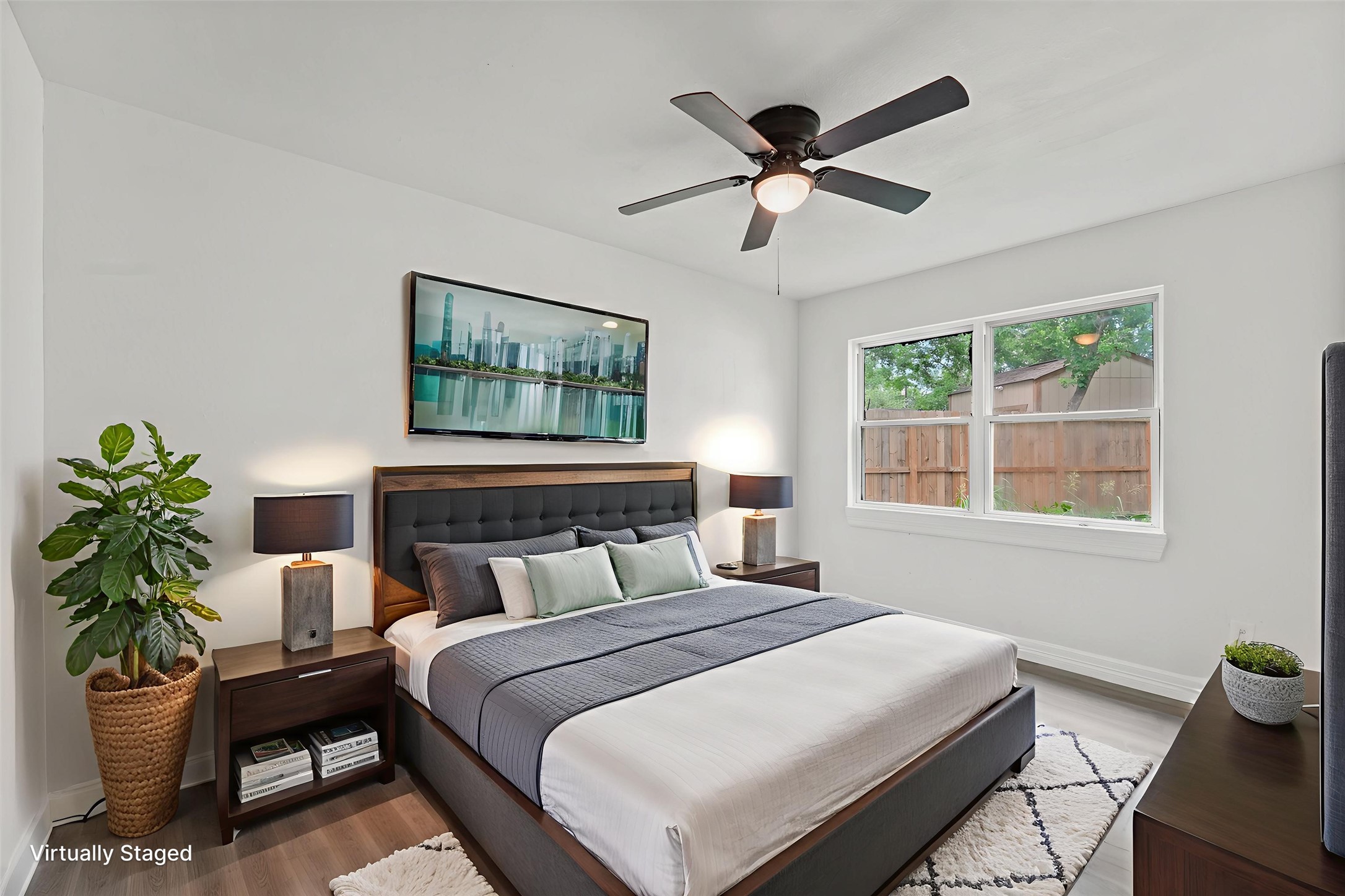 1615 Hiller Street Houston, TX 77015 - Photo 3 of 26 a bedroom with a large bed and a window