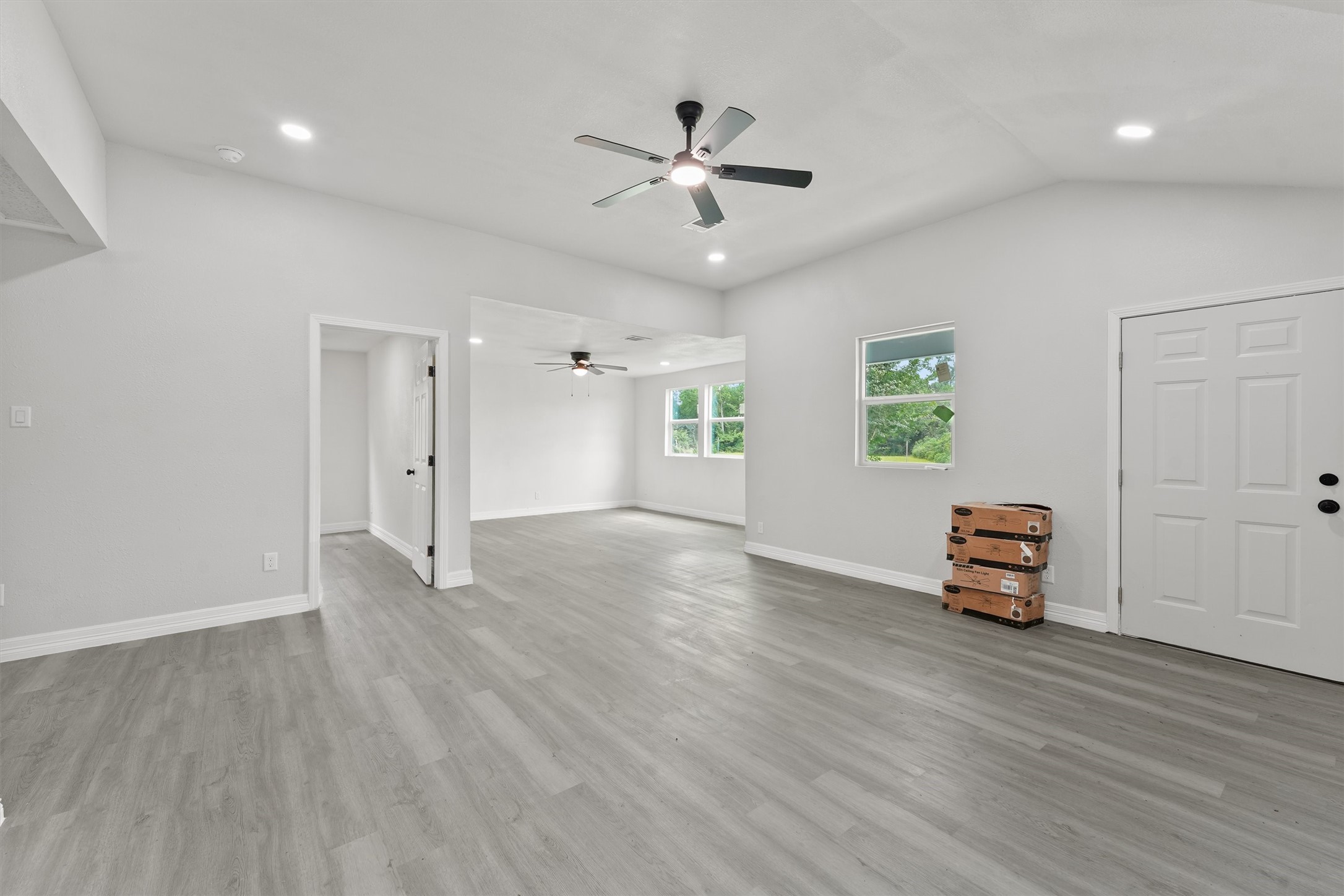 1615 Hiller Street Houston, TX 77015 - Photo 8 of 26 an empty room with window and wooden floor