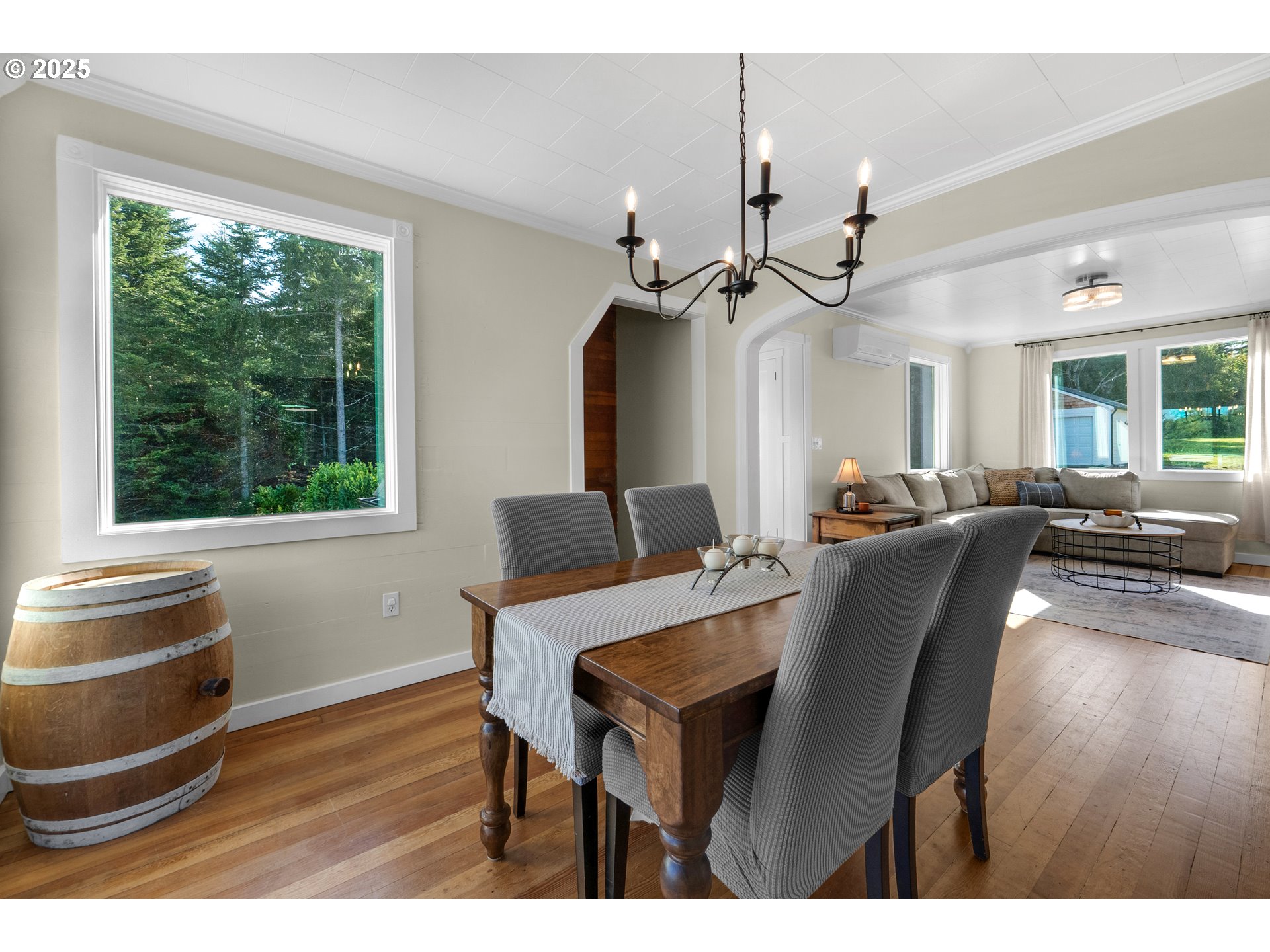 90635 Spring Road Astoria, OR 97103 - Photo 13 of 38 a view of a dining room with furniture window and wooden floor