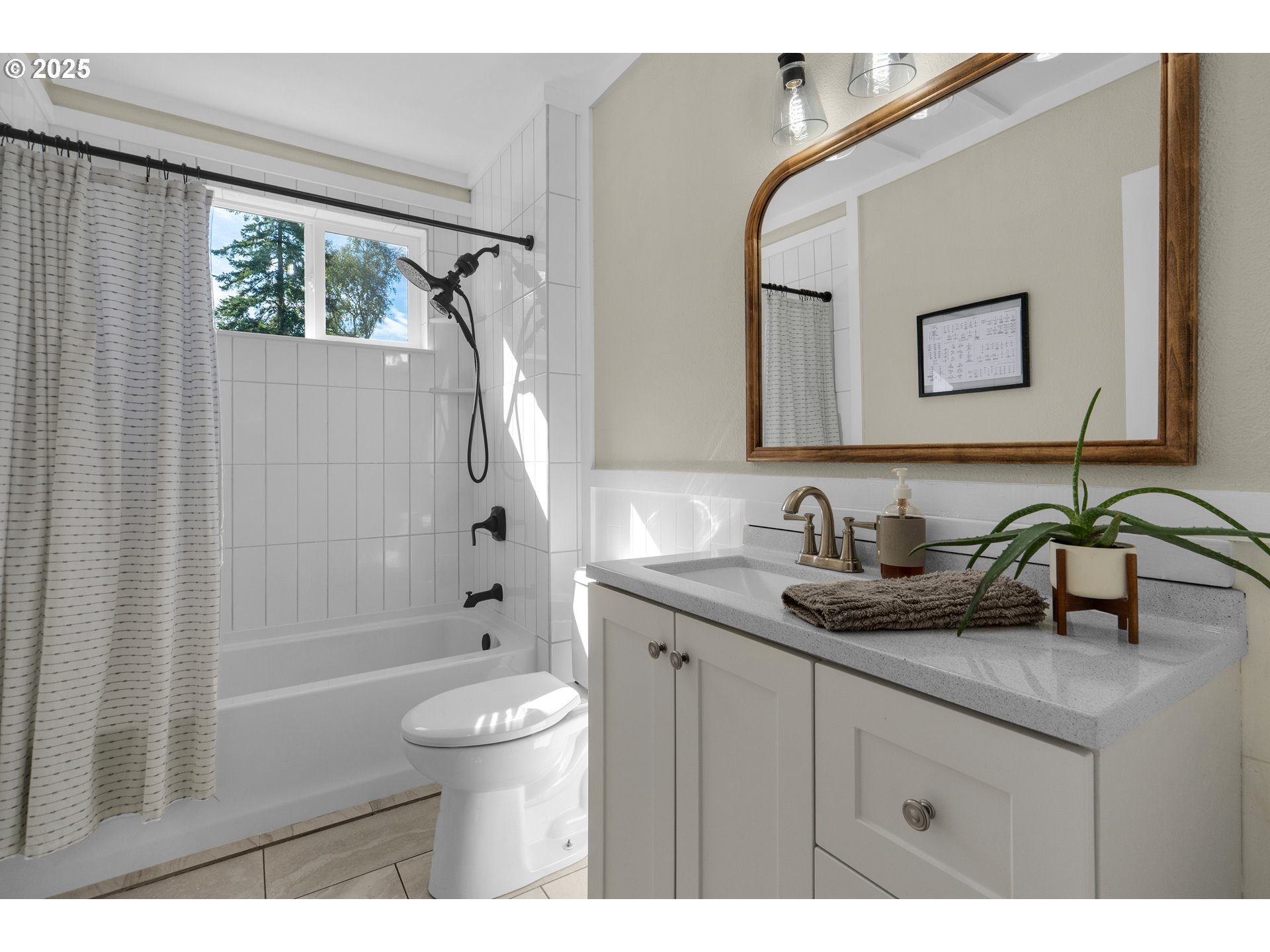 90635 Spring Road Astoria, OR 97103 - Photo 16 of 38 a bathroom with a granite countertop sink a toilet and shower