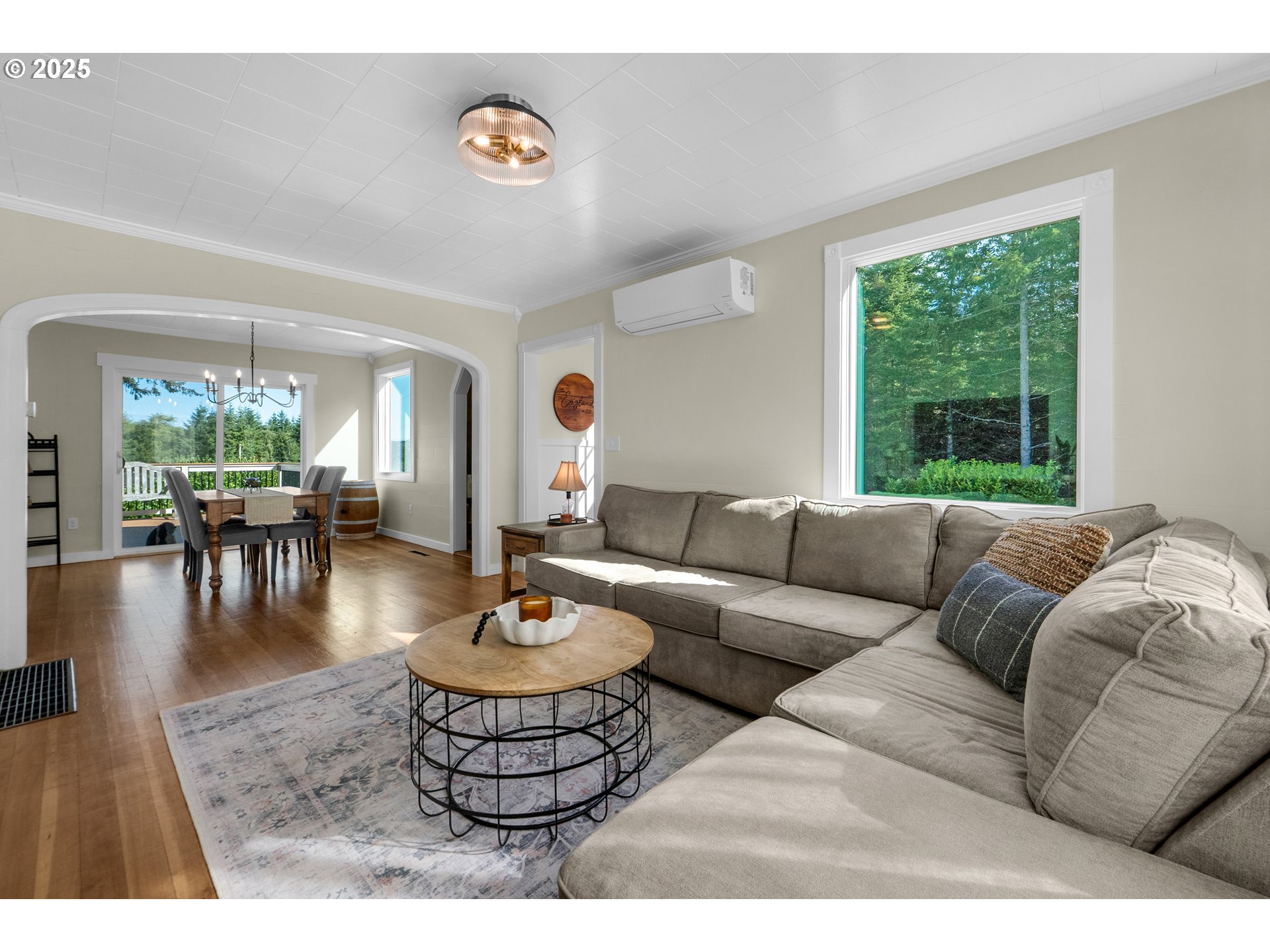 90635 Spring Road Astoria, OR 97103 - Photo 18 of 38 a living room with furniture and a large window