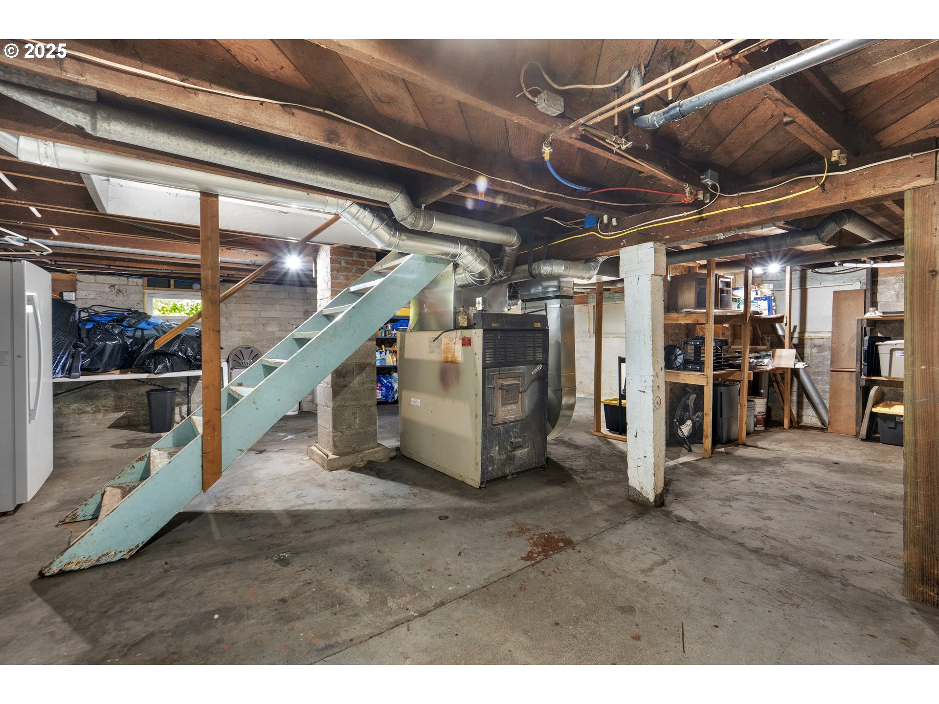 90635 Spring Road Astoria, OR 97103 - Photo 34 of 38 a view of an empty room with wooden floor