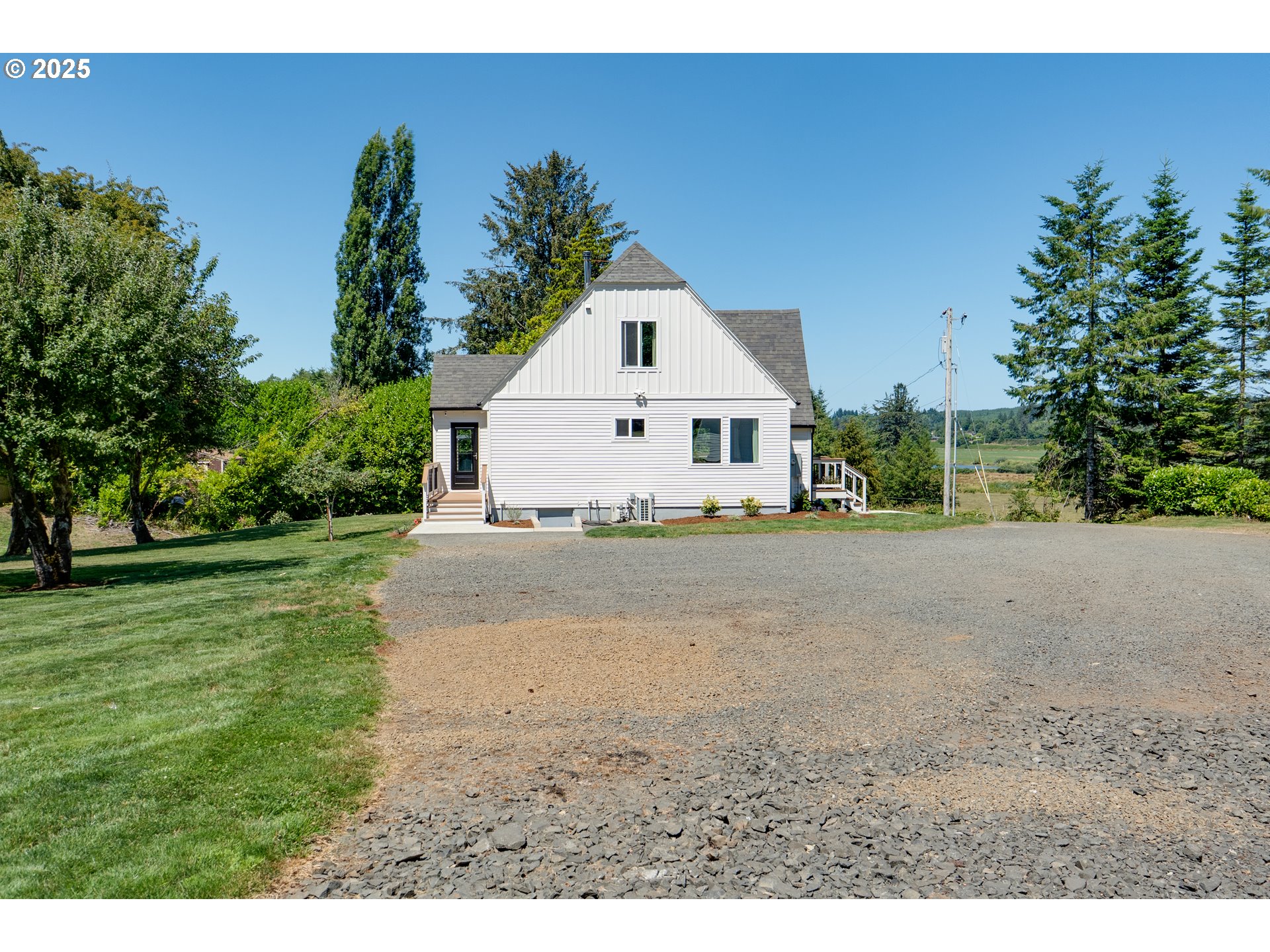 90635 Spring Road Astoria, OR 97103 - Photo 36 of 38 a view of a house with a yard