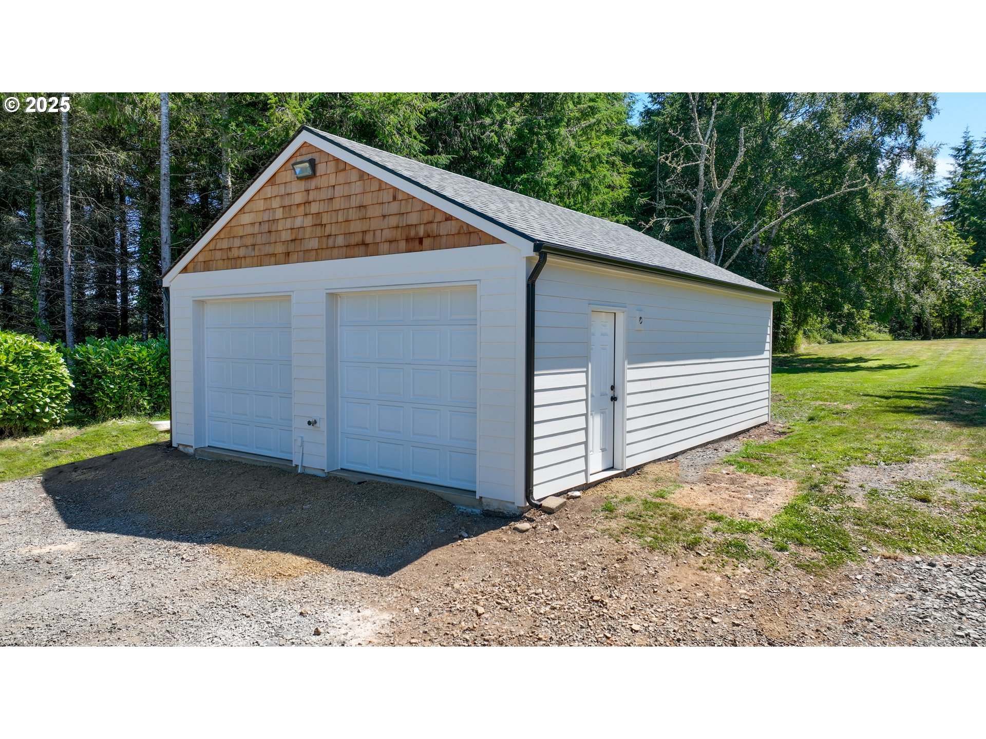 90635 Spring Road Astoria, OR 97103 - Photo 37 of 38 a view of a house with a yard