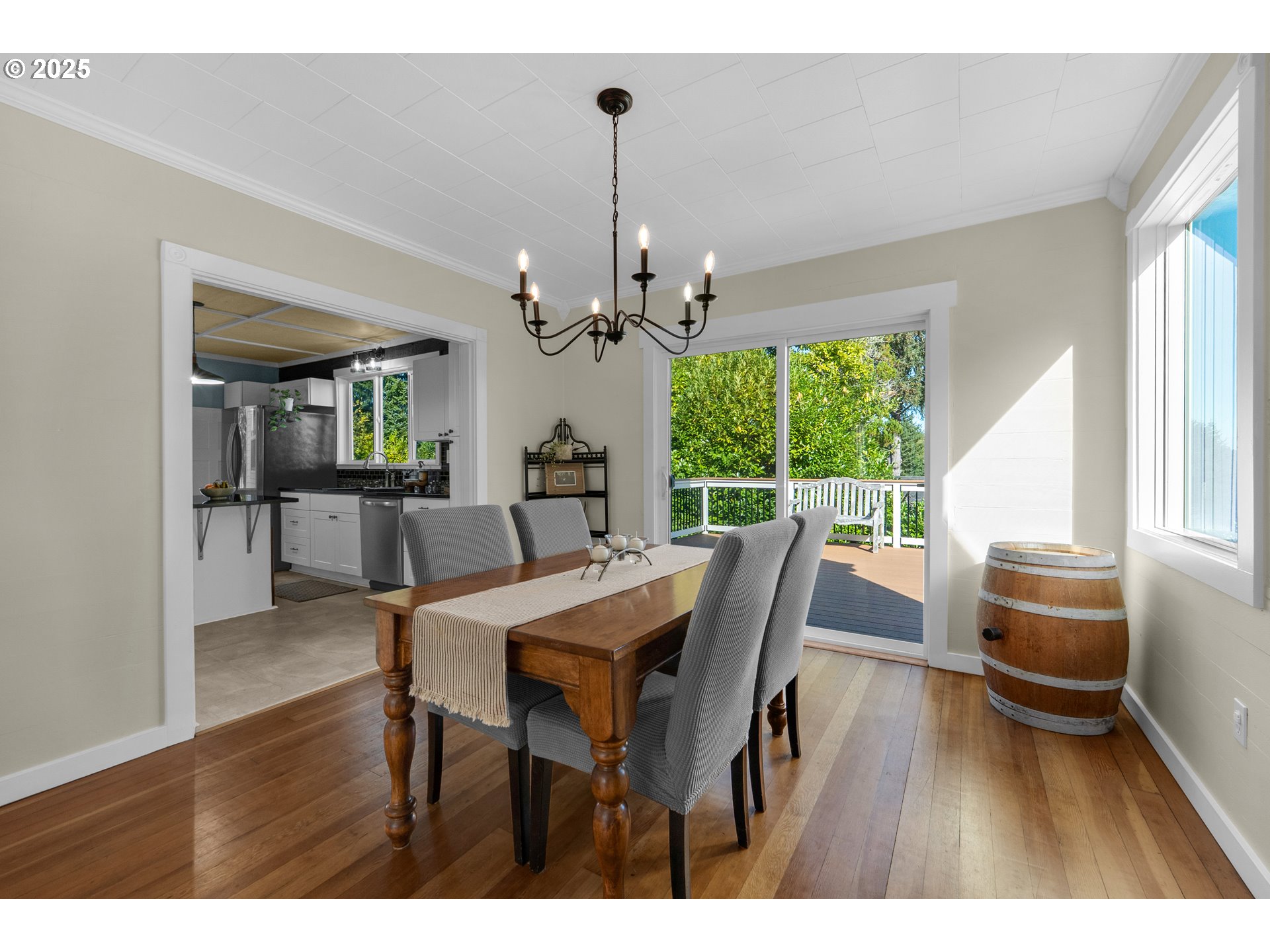 90635 Spring Road Astoria, OR 97103 - Photo 10 of 38 a view of a dining room with furniture window and wooden floor