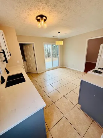 a view of a livingroom with wooden floor