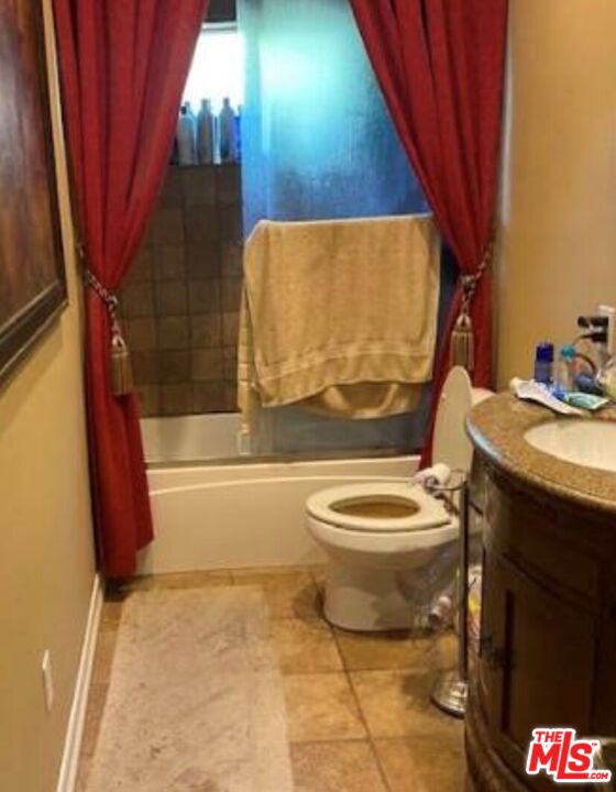 4205 Eve Road Simi Valley, CA 93063 - Photo 7 of 8 a bathroom with a toilet a sink and bathtub