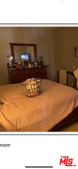 4205 Eve Road Simi Valley, CA 93063 - Photo 8 of 8 a bedroom with a bed and dresser