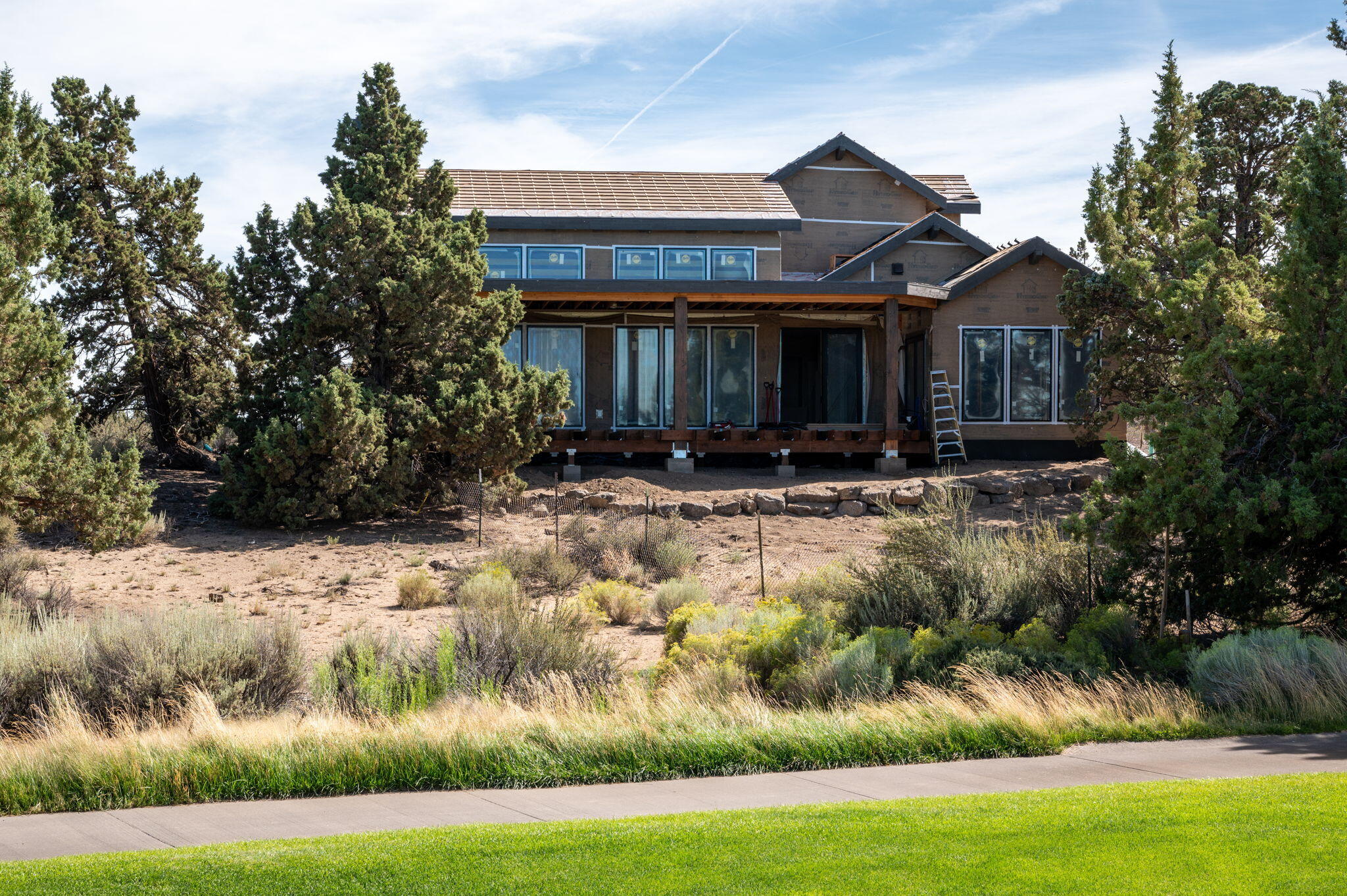 22936 Ghost Tree Lane Bend, OR 97701 - Photo 35 of 74 a front view of a house with a yard