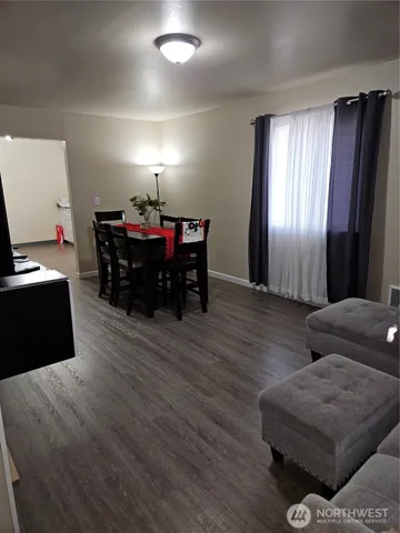 a bedroom with bed and a window