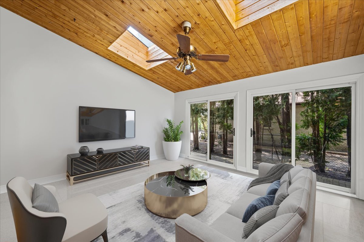 1985 Clavey Road Highland Park, IL 60035 - Photo 13 of 35 a living room with furniture and a flat screen tv