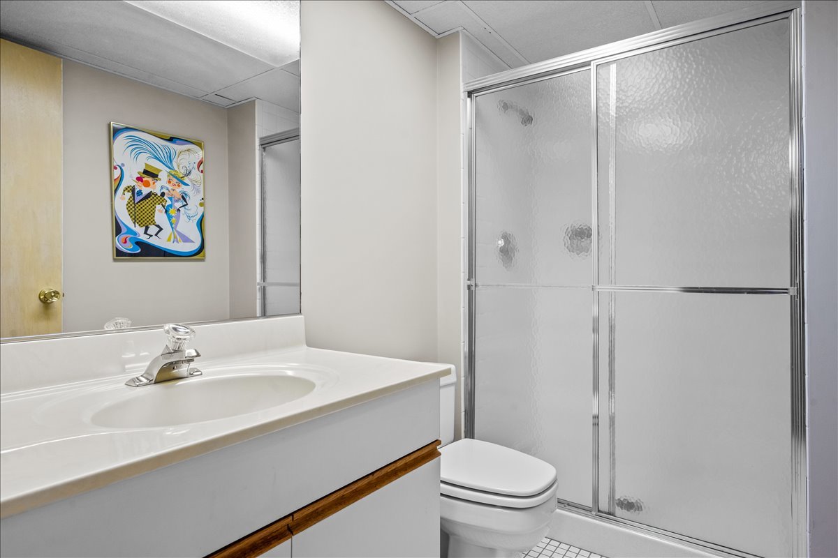 1985 Clavey Road Highland Park, IL 60035 - Photo 26 of 35 a bathroom with a sink mirror toilet and vanity