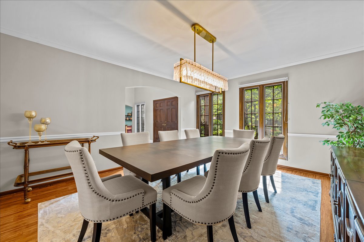 1985 Clavey Road Highland Park, IL 60035 - Photo 3 of 35 a view of a dining room with furniture and wooden floor