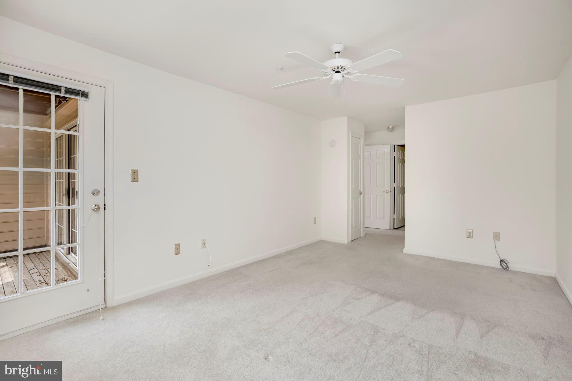 302 Ridgepoint Place, Unit 28 Gaithersburg, MD 20878 - Photo 15 of 23 Master bedroom wit separate door to balcony