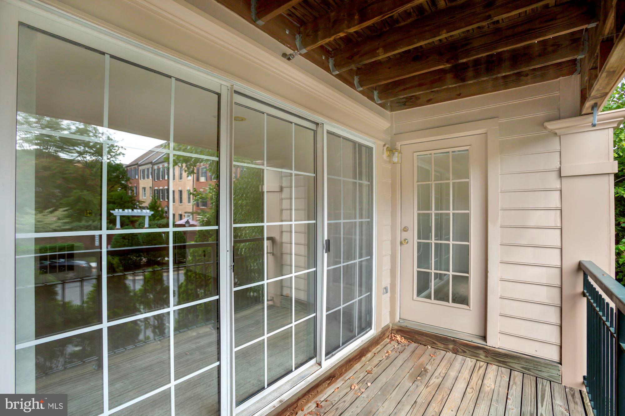 302 Ridgepoint Place, Unit 28 Gaithersburg, MD 20878 - Photo 19 of 23 Balcony with doors to living room and master bedro